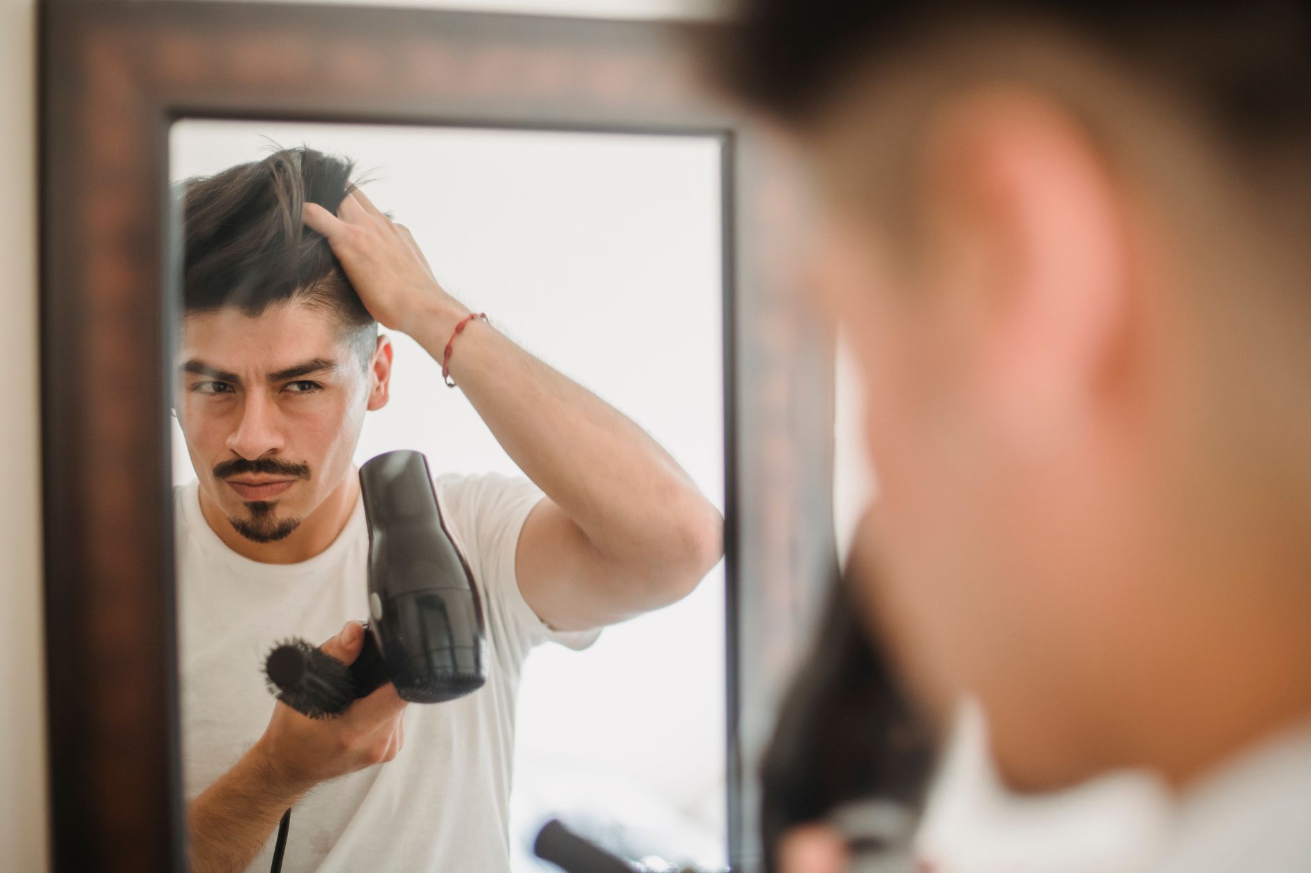 Hair Dryer Has Low Airflow? 6 Causes and How to Fix It 1 Illustration for: Hair Dryer Has Low Airflow? 6 Causes and How to Fix It